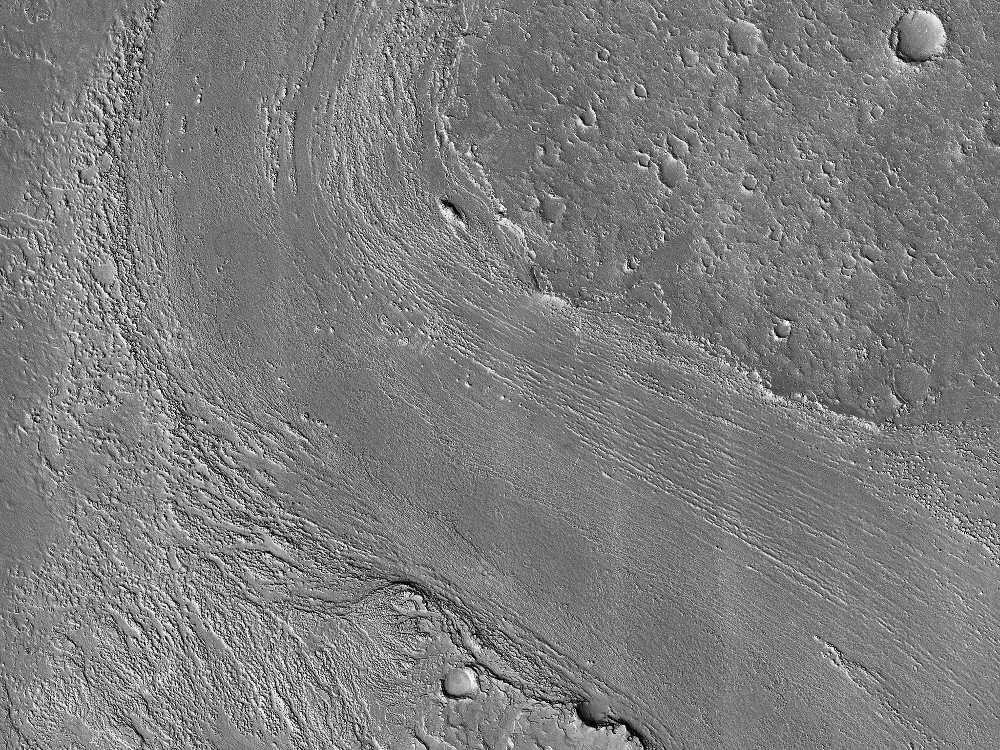 HiRISE image ESP_057978_1875 Athabasca Valles distributary showing lava flows originating from Elysium Mons to the northwest